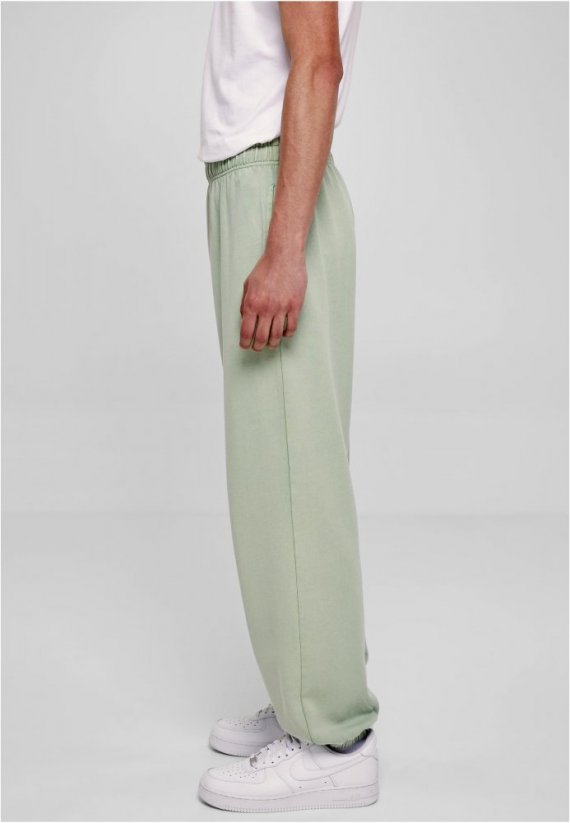 Męskie spodnie dresowe Urban Classics Wash Sweatpants - jasnozielone