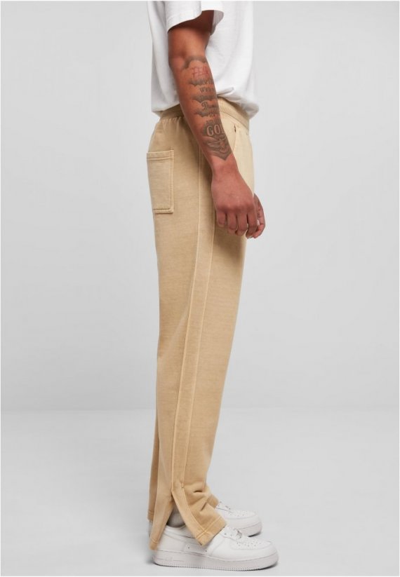 Męskie spodnie dresowe Urban Classics Heavy Terry Garment Dye Slit Sweatpants - beż