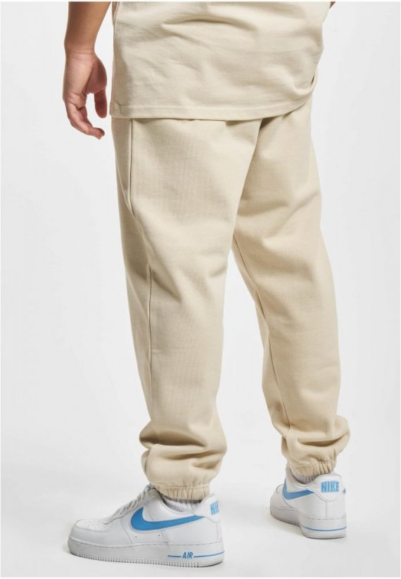 Męskie spodnie dresowe DEF Loose - beż