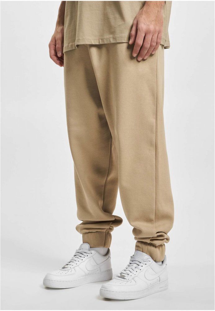 Světle hnědé pánské tepláky DEF Sweatpants XL